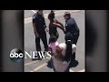 Tense confrontation between Phoenix police and a young family